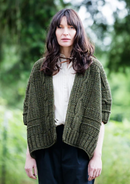 A woman wearing a knitted sweater