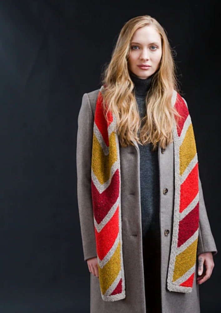 A woman wearing a knitted scarf