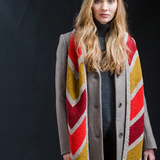 A woman wearing a knitted scarf