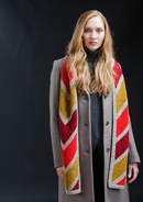 A woman wearing a knitted scarf