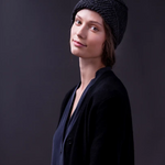 A woman wearing a knitted hat