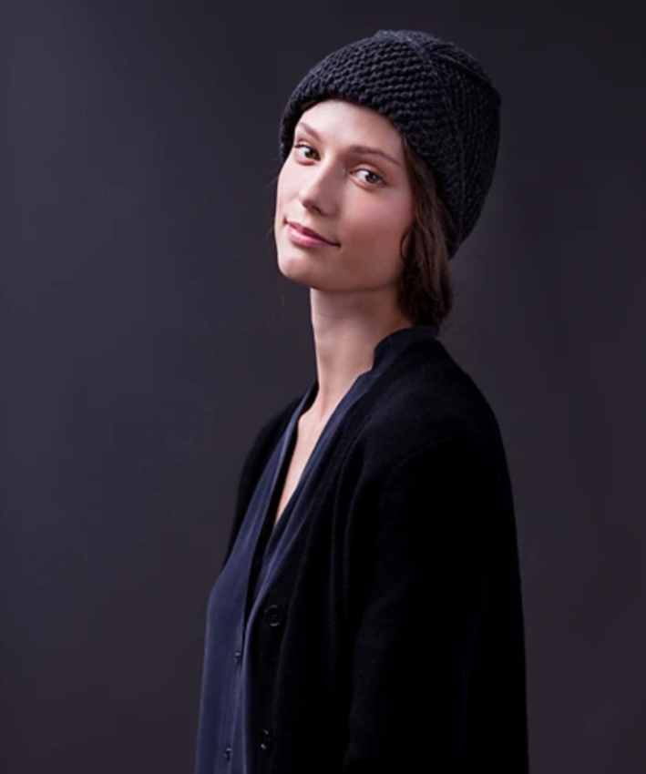 A woman wearing a knitted hat