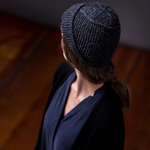 A woman wearing a knitted hat