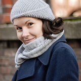 A woman wearing a knitted hat