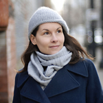 A woman wearing a knitted hat