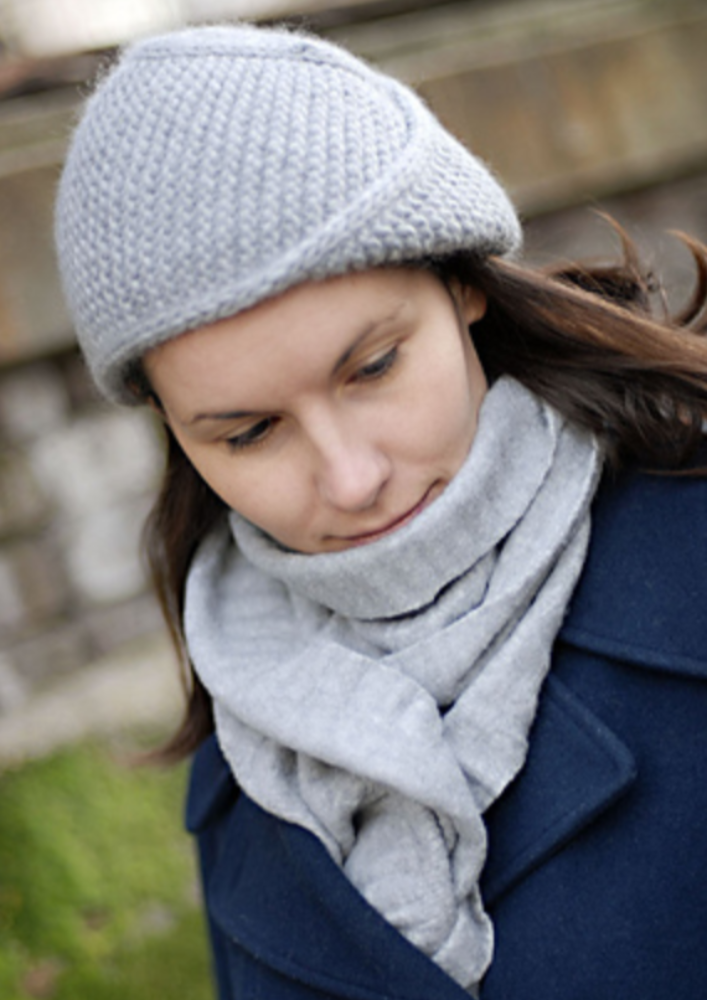 A woman wearing a knitted hat
