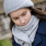 A woman wearing a knitted hat