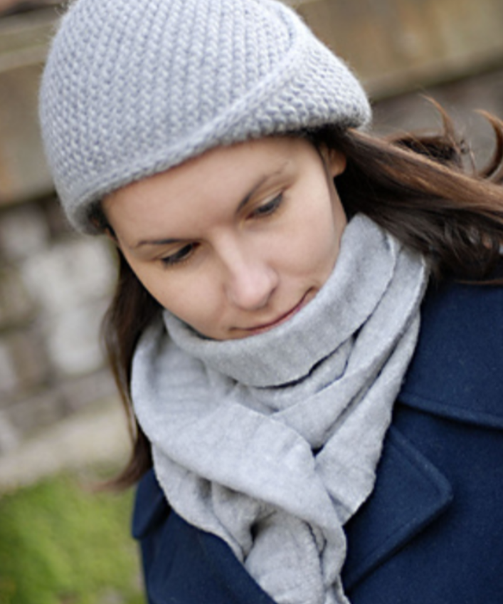 A woman wearing a knitted hat