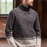 A man wearing a knitted turtleneck sweater