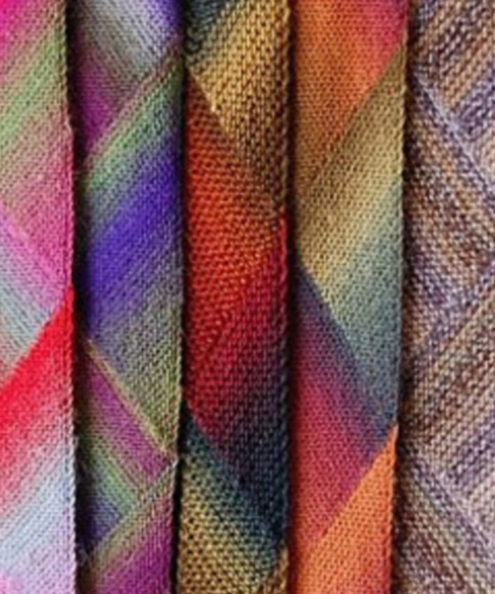 A group of multicolored scarves
