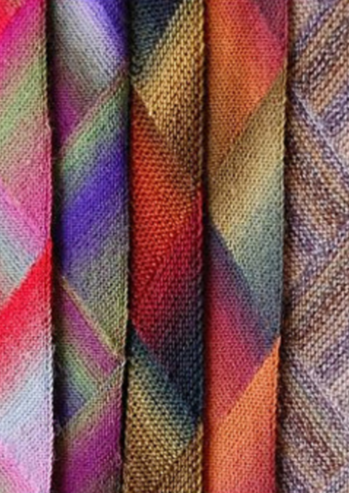 A group of multicolored scarves