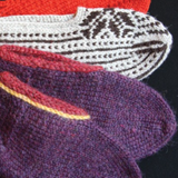 Four knitted slippers