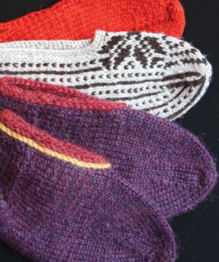 Four knitted slippers