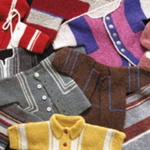 A group of knitted children's jackets