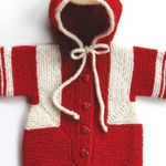 A knitted child's jacket with hood