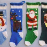 Four knitted Christmas stockings