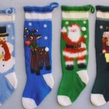 Four knitted Christmas stockings