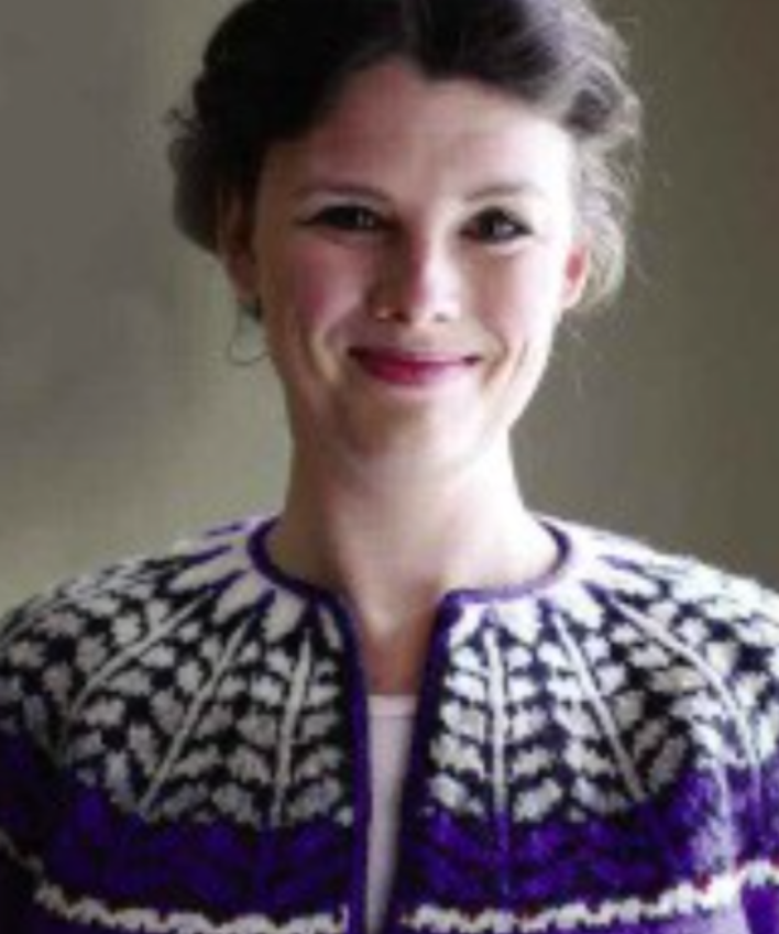 A woman wearing a colorwork sweater