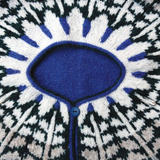 A close-up photo of a knitted, colorwork yoke