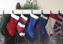 Colorful stockings hanging on a mantle