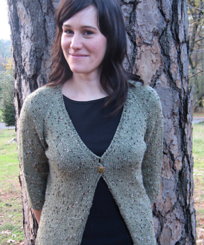 A woman wearing a knitted sweater