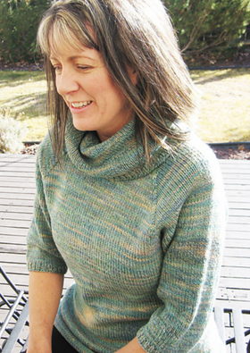 A woman wearing a knitted sweater
