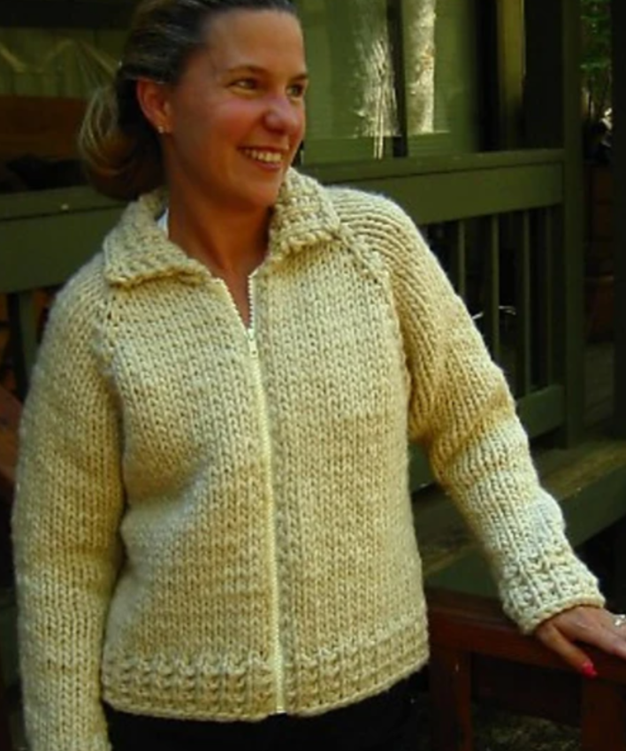 A woman wearing a knitted sweater