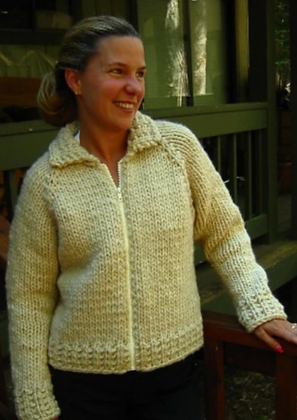 A woman wearing a knitted sweater
