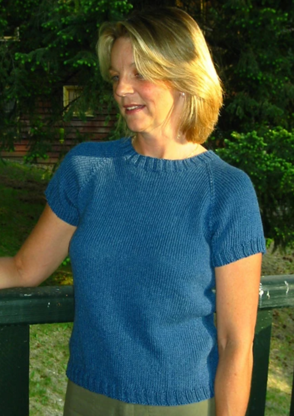 A woman wearing a knitted sweater