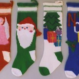 A row of four knitted stockings