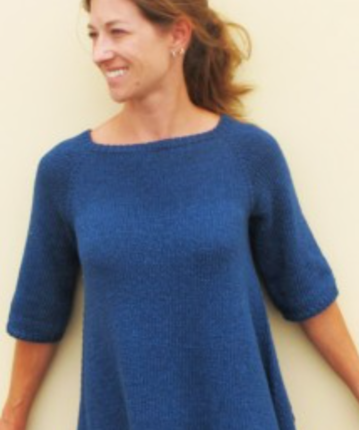 A woman wearing a knitted sweater