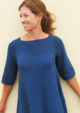 A woman wearing a knitted sweater