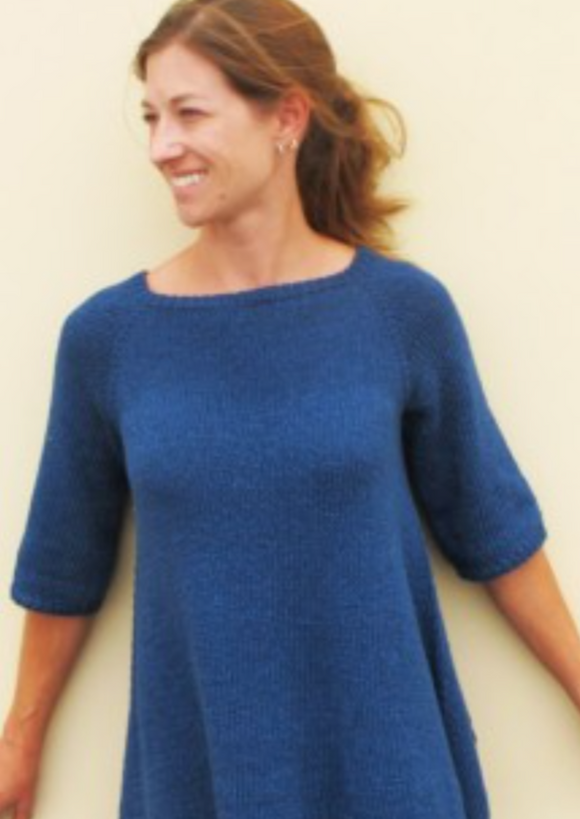 A woman wearing a knitted sweater