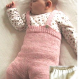 A baby wearing a knitted bottom