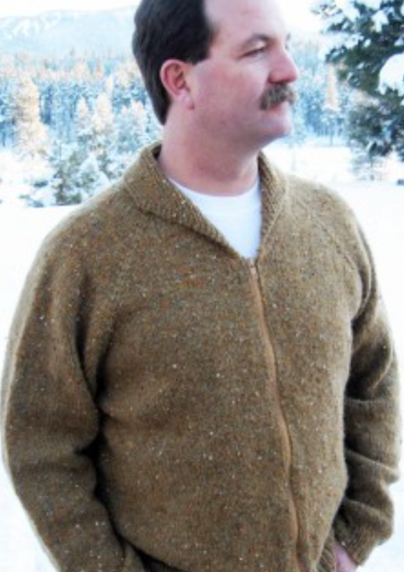 A man wearing a knitted sweater