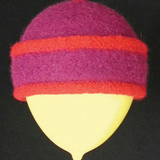 A colorful felted hat modeled on a balloon