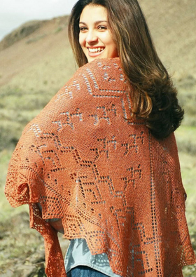 A woman wearing a knitted shawl