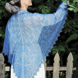 A woman wearing a knitted shawl