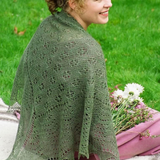 A woman wearing a knitted shawl