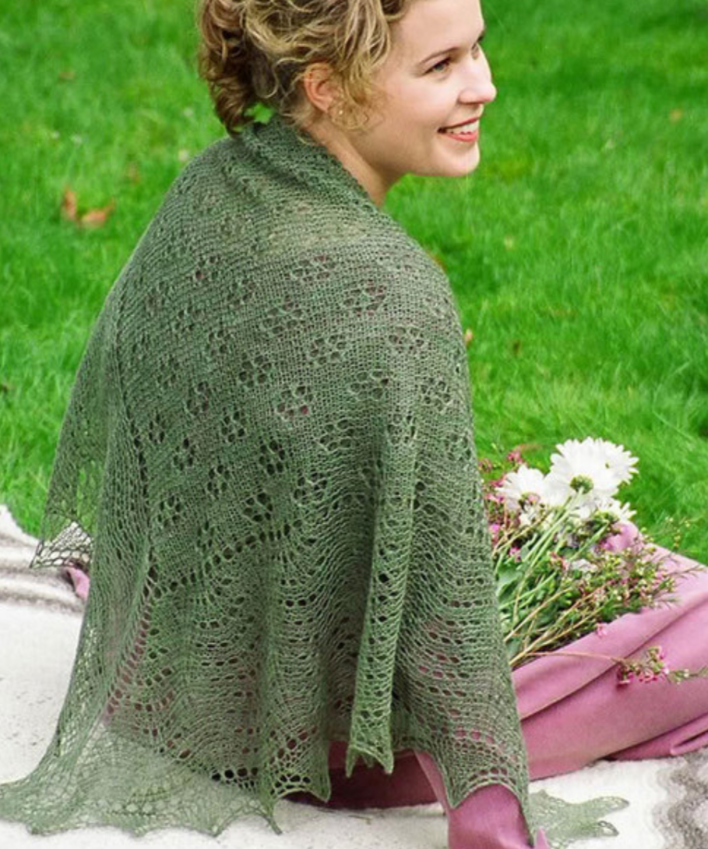 A woman wearing a knitted shawl