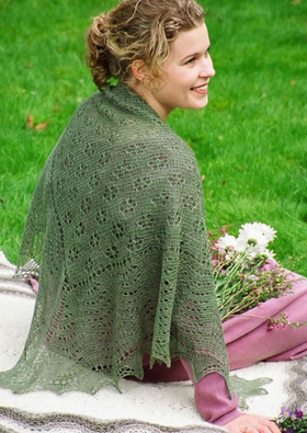 A woman wearing a knitted shawl