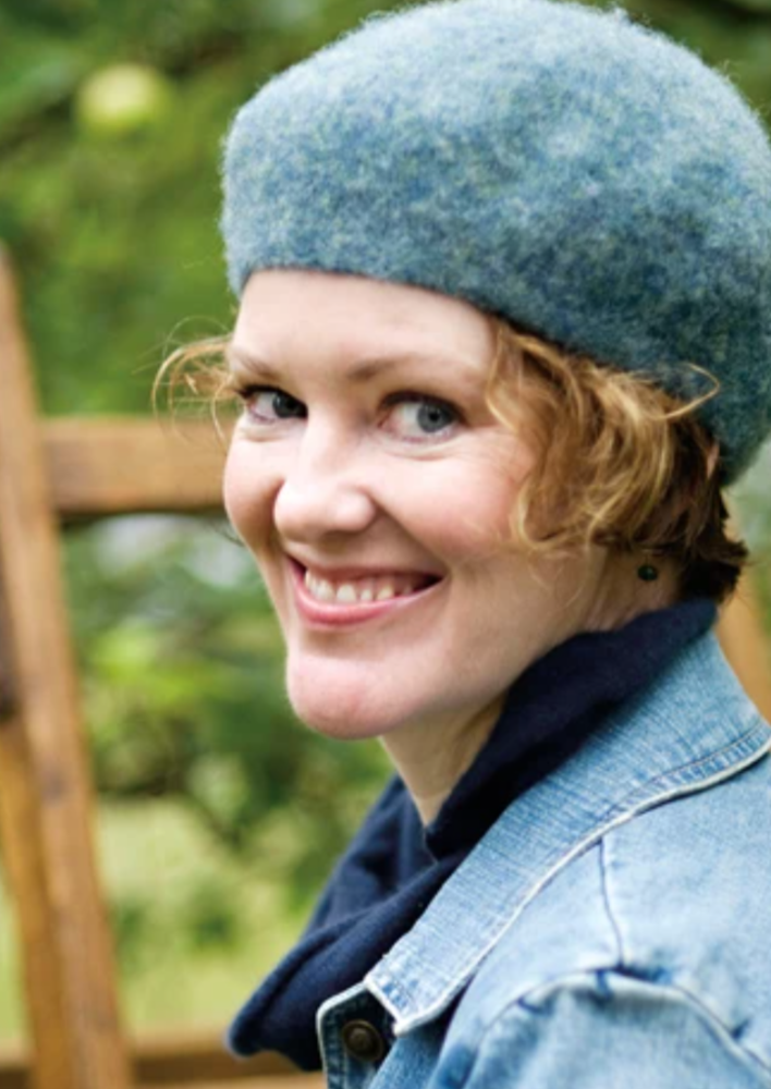 A woman wearing a felted beret