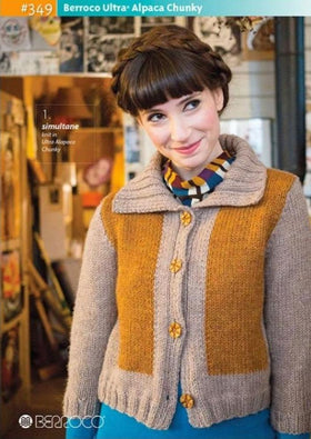 A woman in milkmaid braids wearing a knit two tone sweater