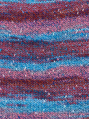 Swatch of Berroco Sesame Yarn Color blue, pink, red