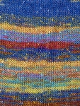 Swatch of Berroco Sesame Yarn Color blue, yellow, red, green