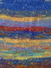 Swatch of Berroco Sesame Yarn Color blue, yellow, red, green