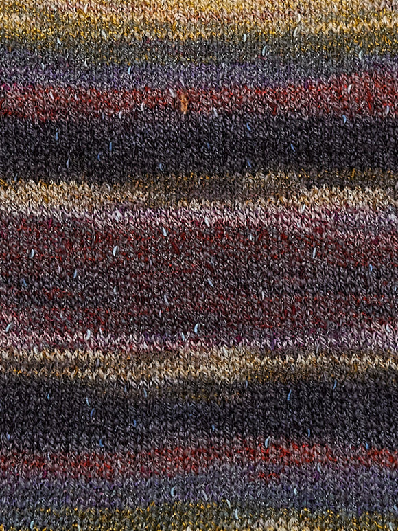 Swatch of Berroco Sesame Yarn Color yellow, black, grey, red