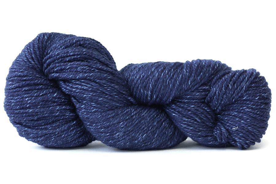 A photo of a blue hank of Simplinatural yarn.