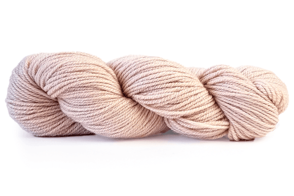 A photo of a pink hank of Simplinatural yarn.