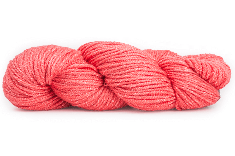 A photo of a pink hank of Simplinatural yarn.